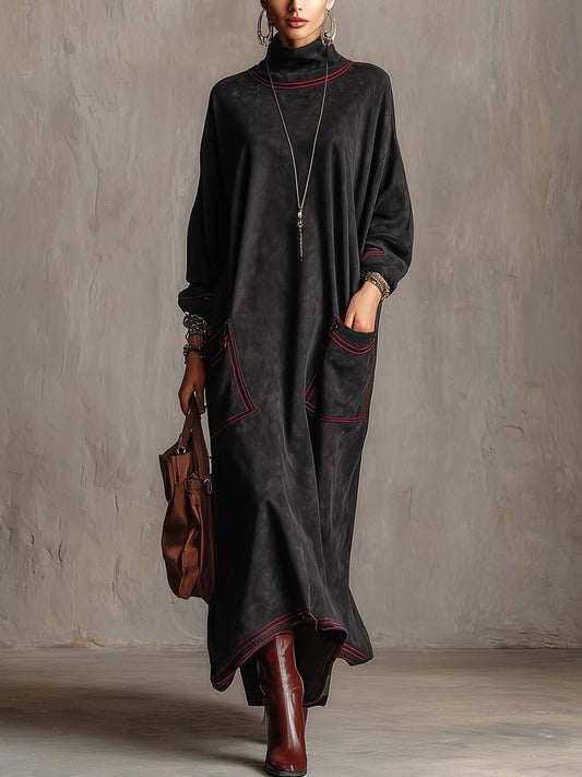 Estela | Vestido largo de ante sintético negro con pespuntes en contraste rojo y bolsillos de parche