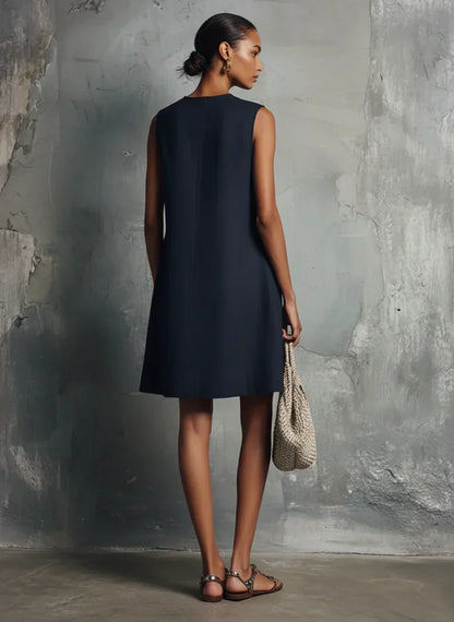 CALYPSO | Minivestido Azul Oscuro con Escote Redondo, Botones Asimétricos y Bolsillo
