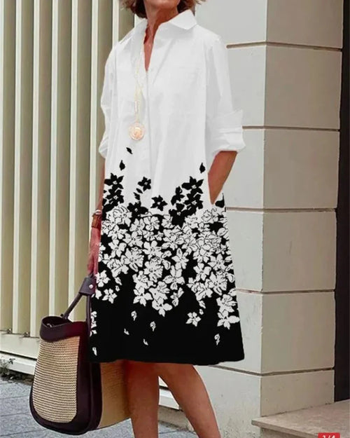 Vestido midi abotonado · Flores negras