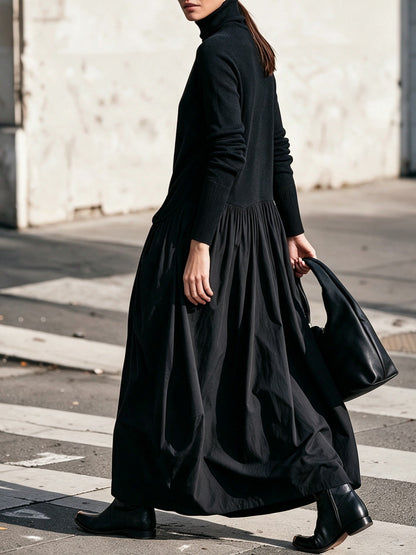 Belén | Vestido maxi oversize negro con cuello alto y bolsillos