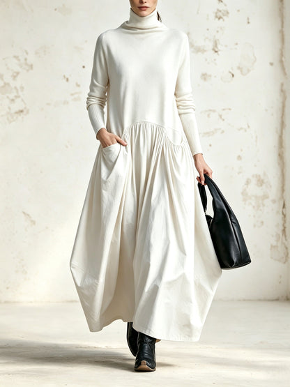 Belén | Vestido maxi oversize negro con cuello alto y bolsillos